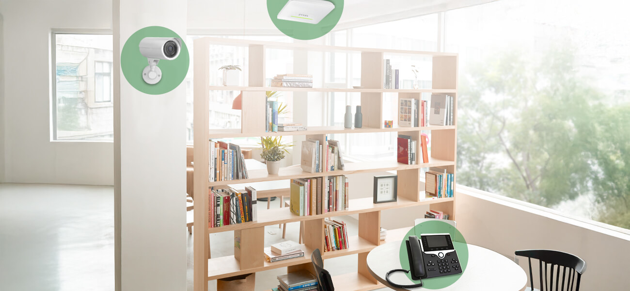 Scenario showing Zyxel smart PoE from the product powering an IP camera, access point, and IP phone.