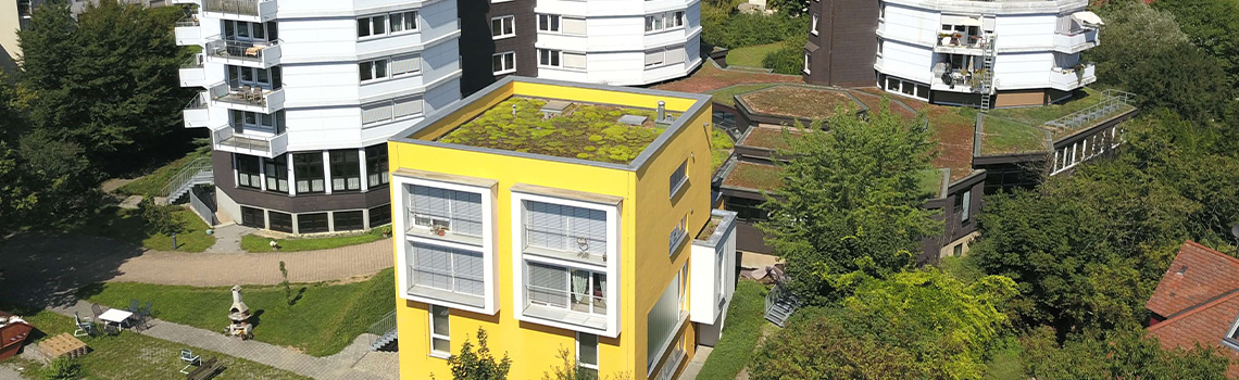 Upgraded Albrecht-Bengel-Haus in Germany with four dormitory buildings featuring Nebula cloud management, WiFi 6, and smart switches.