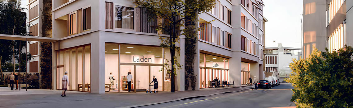 Modern multi-story urban building with white facade, pink awnings, and large windows, featuring people on a city sidewalk. 