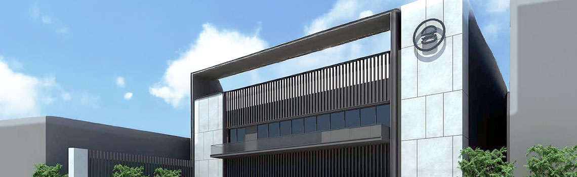 City Burger corporate office building exterior with modern minimalist design, glass windows, vertical slats, and trees.
