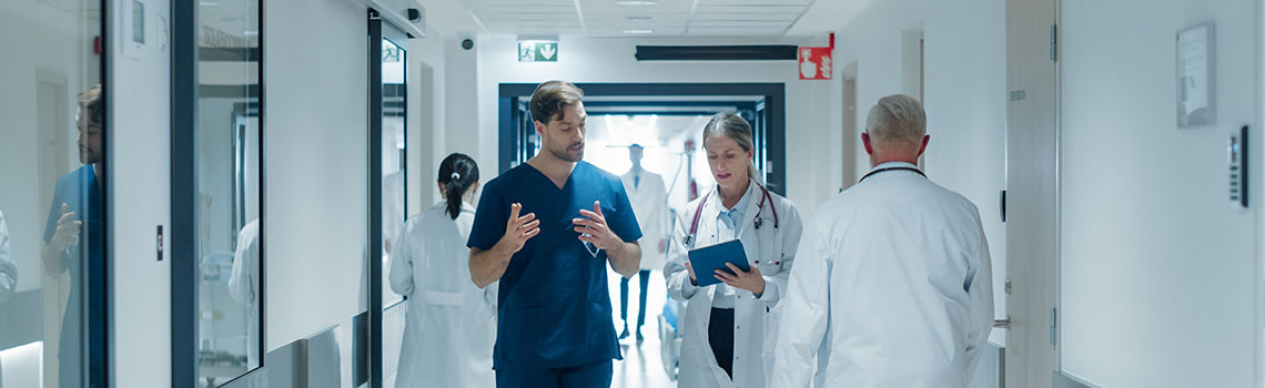 Medical staff walk through an Ahmedabad hospital enabled by Zyxel switches for fast data access and seamless operations